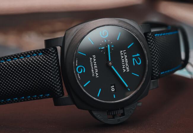The blue hour markers and hands are striking on the black dial.