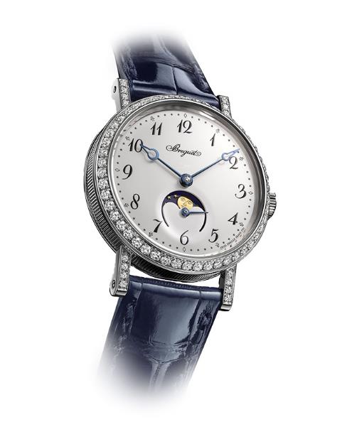 The blue strap fake watch is decorated with diamonds.